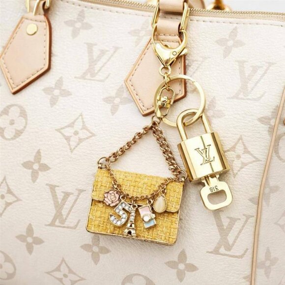 Authentic Louis Vuitton Lock & Key with unbranded Butterfly Bagcharm Keychain